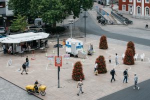 A top-down view of the full Hammer Caretaker Championships course, including stations, markings, mini-excavator, and passing pedestrians.